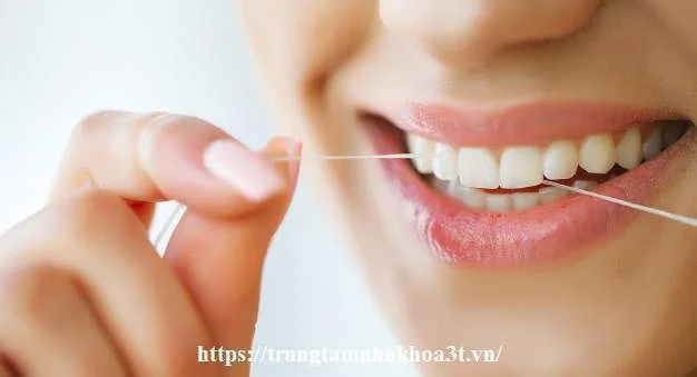 dental care woman with beautiful smile using floss teeth image 118454 4125 3.jpg